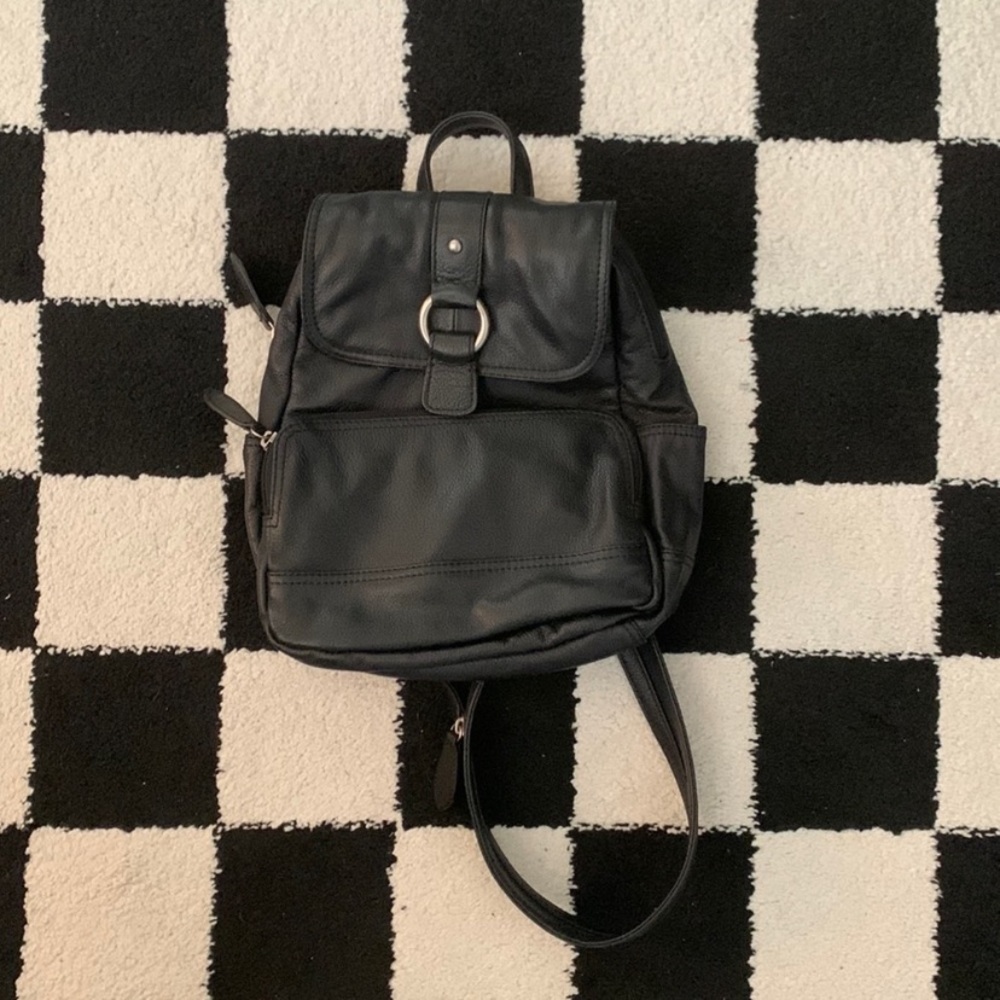 Wilson’s leather pack pack zippable straps (forms one strap from two)